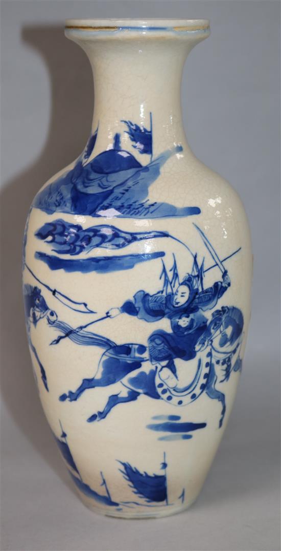 A Chinese blue and white soft paste porcelain vase, 18th century, with a Kangxi mark, 18cm